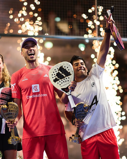 Chingoto and galan raising the rome 2025 premier padel major trophy